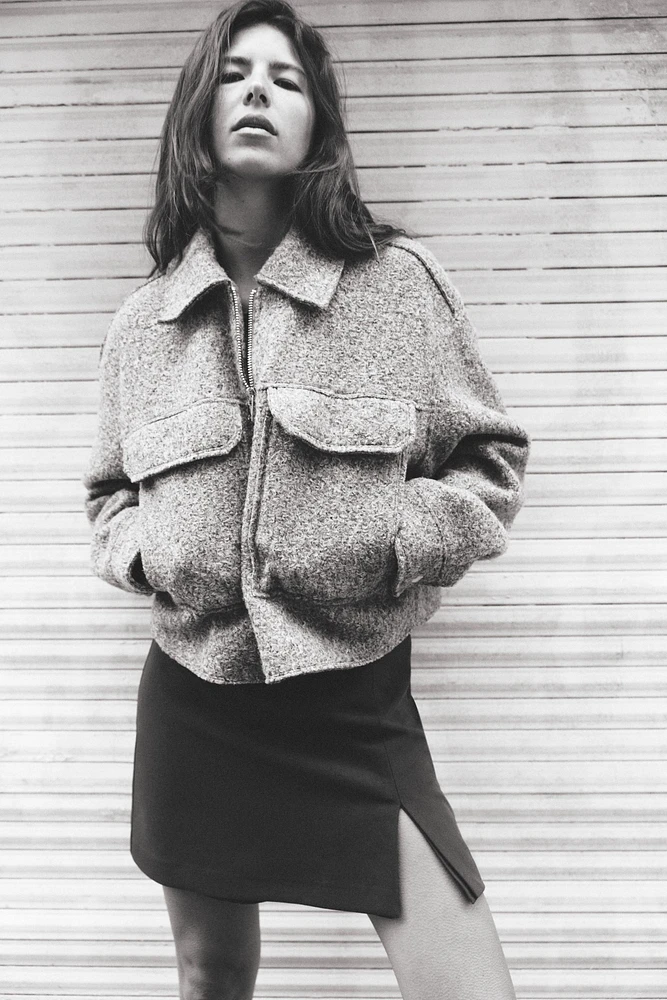 VESTE COURTE BOUCLÉE
