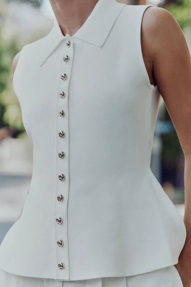 TOP GILET EN MAILLE PÉPLUM