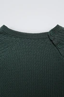 CABLE KNIT SWEATER