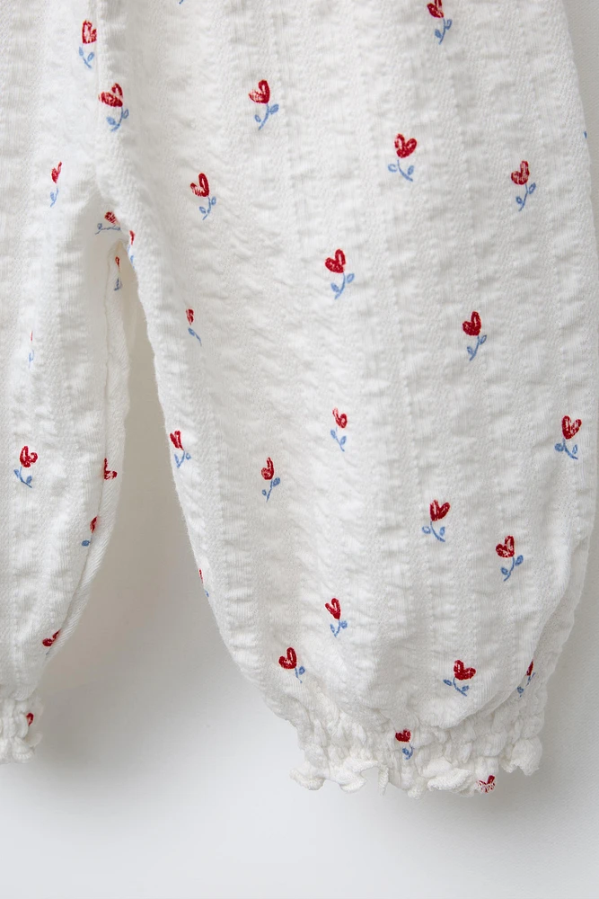 PANTALON À TEXTURE ET IMPRIMÉ FLEURS