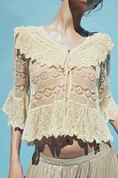 BLOUSE EN MAILLE POINTELLE À VOLANTS