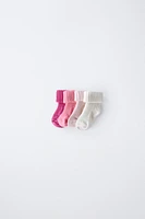 LOT DE QUATRE PAIRES CHAUSSETTES COULEURS