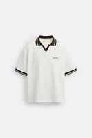 POLO JACQUARD INSCRIPTION BRODÉE