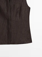 Veste sans manches col rond en lin mélangé