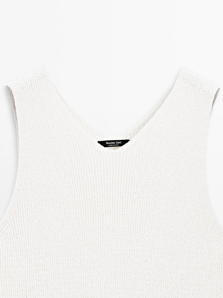 Knit dress with fringed hem