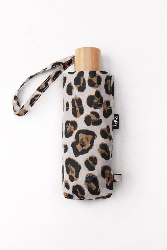 ANIMAL PRINT TELESCOPING UMBRELLA