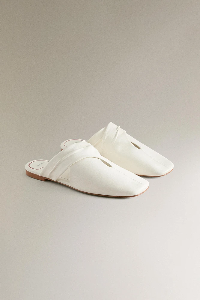 MULES CROISÉES CUIR