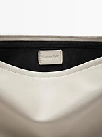 Petit sac pochette avec nœud en cuir nappa