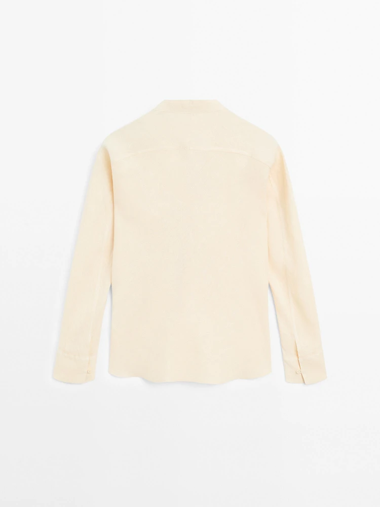 Flowing linen shirt with stand collar