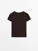 T-shirt with metal studs