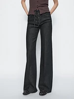 Flared jeans with tie detail