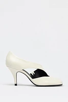 ASYMMETRIC LEATHER HEELS