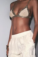 SOUTIEN-GORGE TRIANGLE RELIEF FANTAISIE