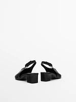 High-heel slingback shoes