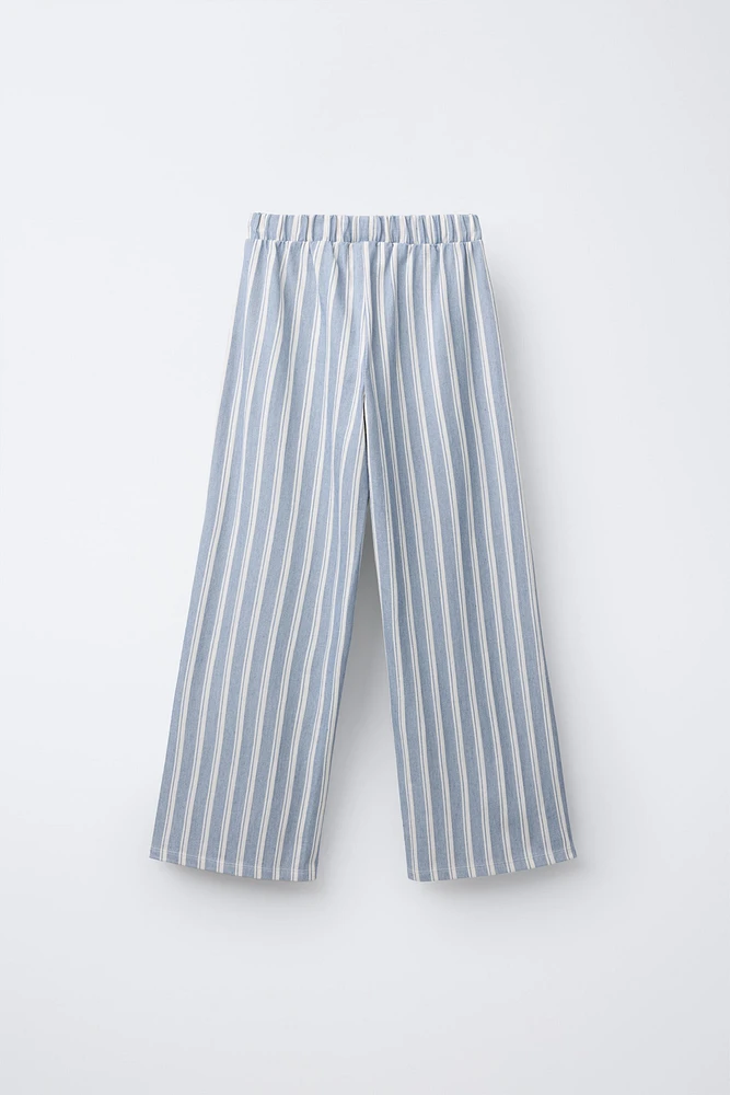 STRIPED PANTS WITH PIPED POCKETS