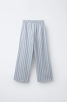 STRIPED PANTS WITH PIPED POCKETS