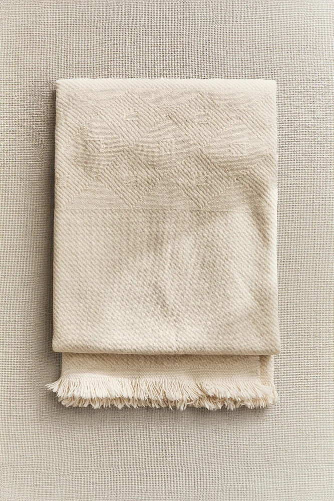 PLAIN WOOL BLANKET WITH FRINGING