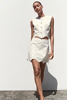 EMBROIDERED EYELET VEST TOP