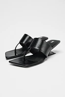 ASYMMETRIC WEDGE HEELS