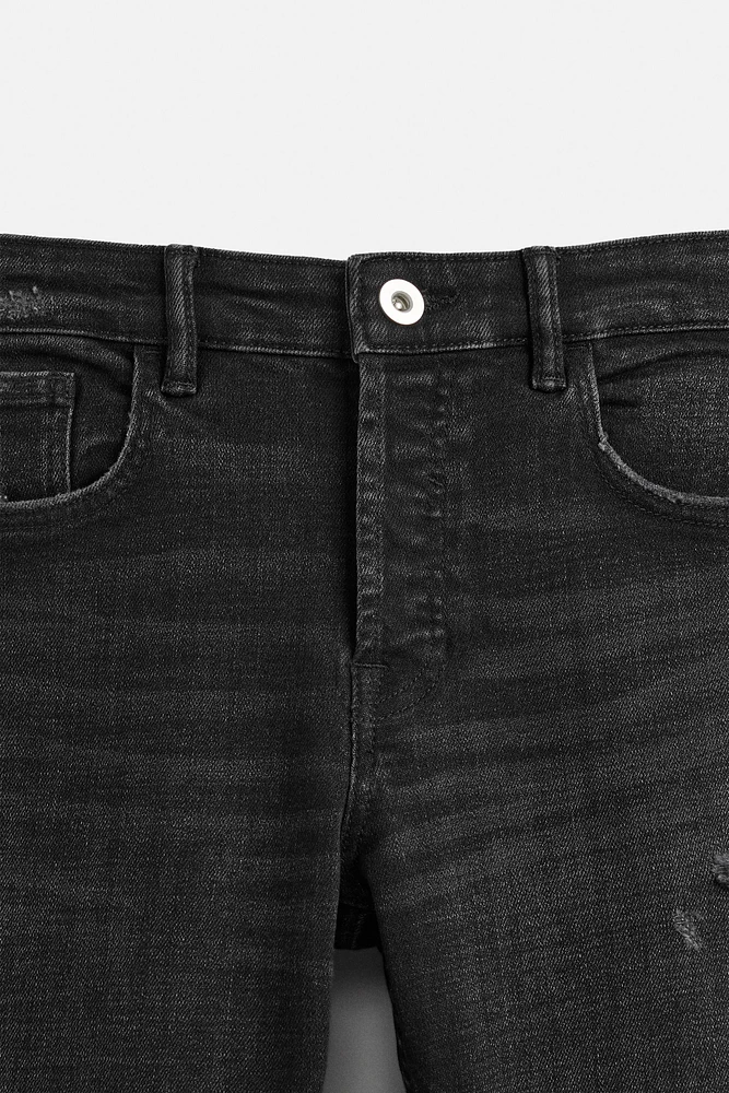RIPPED SKINNY JEANS