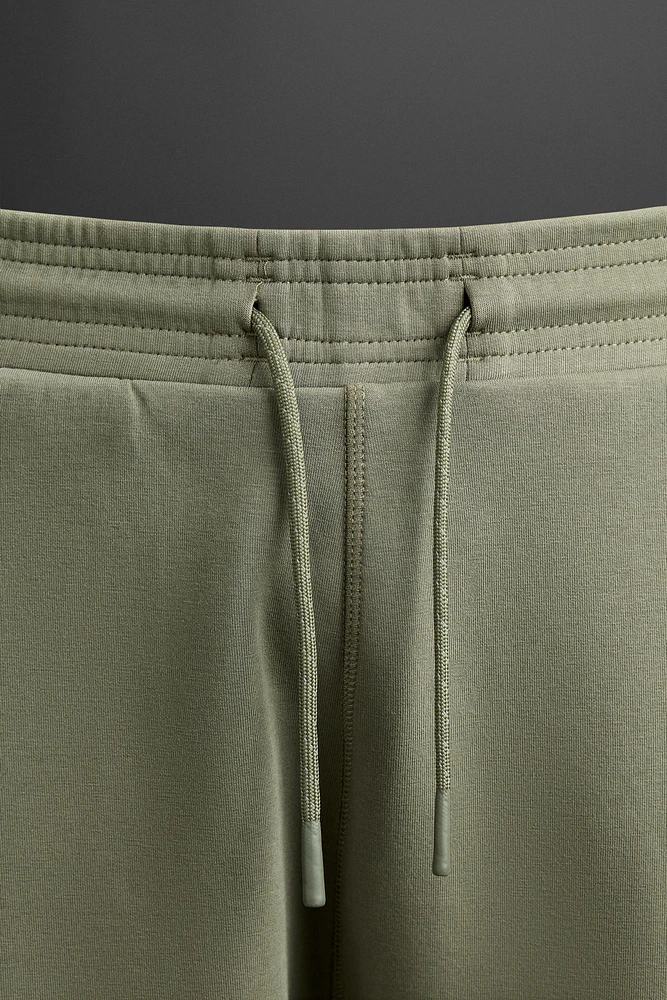 PANTALON DE JOGGING TECHNIQUE À ZIPS