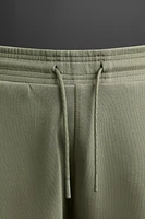 PANTALON DE JOGGING TECHNIQUE À ZIPS