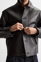 BLOUSON EN CUIR À POCHES