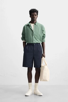 BERMUDA RELAXED FIT À PLIS