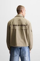 BLOUSON INSCRIPTION IMPRIMÉE GUITARRICADELAFUENTE