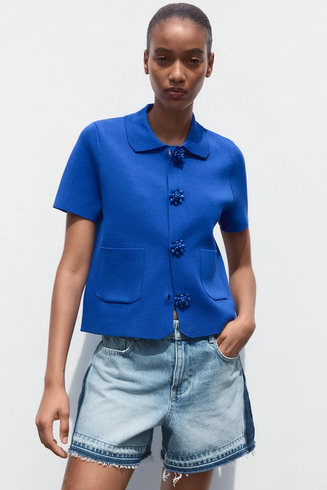 GILET EN MAILLE BOUTONS FANTAISIE