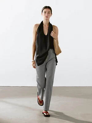Striped low-rise straight-leg jeans