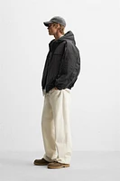 HOODED TECHNICAL JACKET