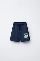 SURF PRINT PLUSH SHORTS