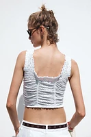 TOP AVEC BRODERIES PERFORÉES