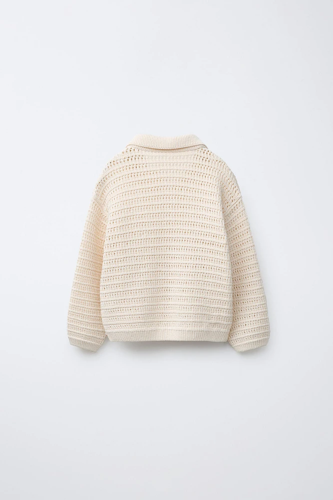 OPEN KNIT SWEATER