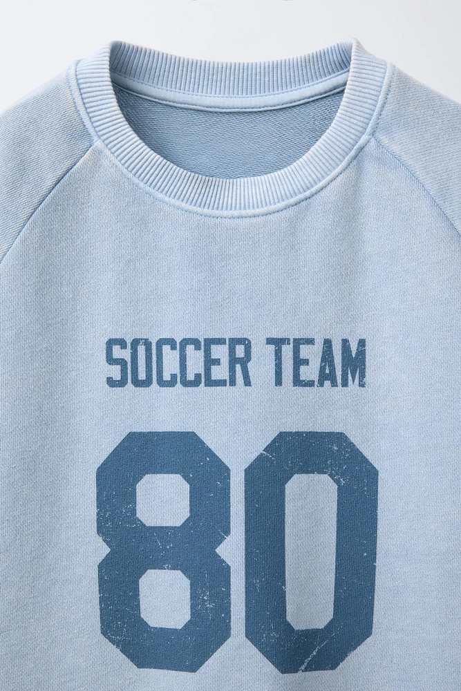 T-SHIRT À MANCHES RAGLAN IMPRIMÉ