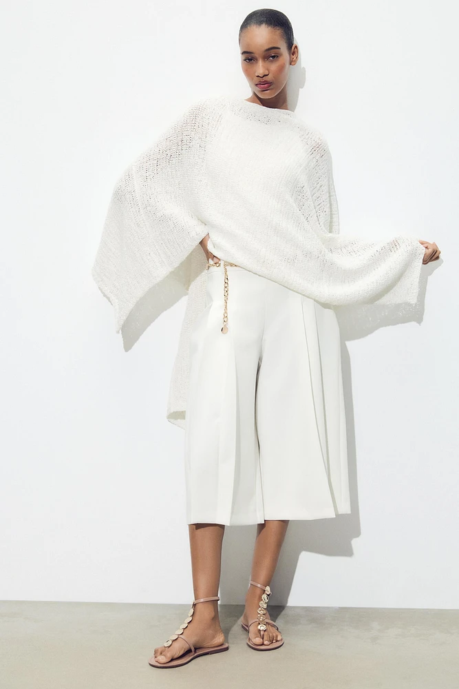 BELTED PLEATED LONG SHORTS