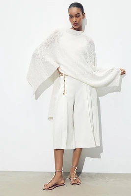 BELTED PLEATED LONG SHORTS
