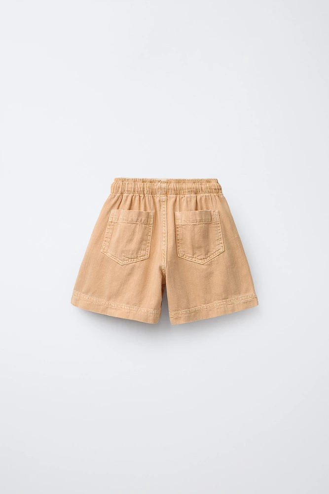 SHORT À TAILLE PLISSÉE