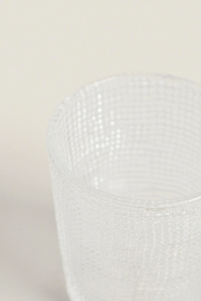 GLASS CUP WITH RAISED DESIGN