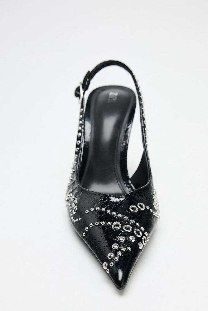 STUDDED HEELED PUMPS