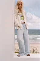 JEAN LARGE À TAILLE FINE