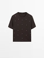 Oversized T-shirt with eyelets
