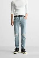 RIPPED SKINNY JEANS