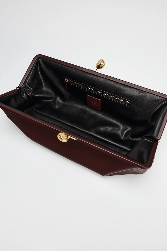 METAL TRIM LEATHER CLUTCH