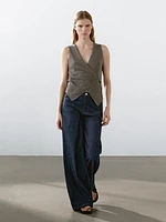 Mouliné knit crossover vest