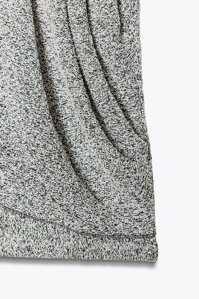 TOP BUSTIER BOUCLÉ