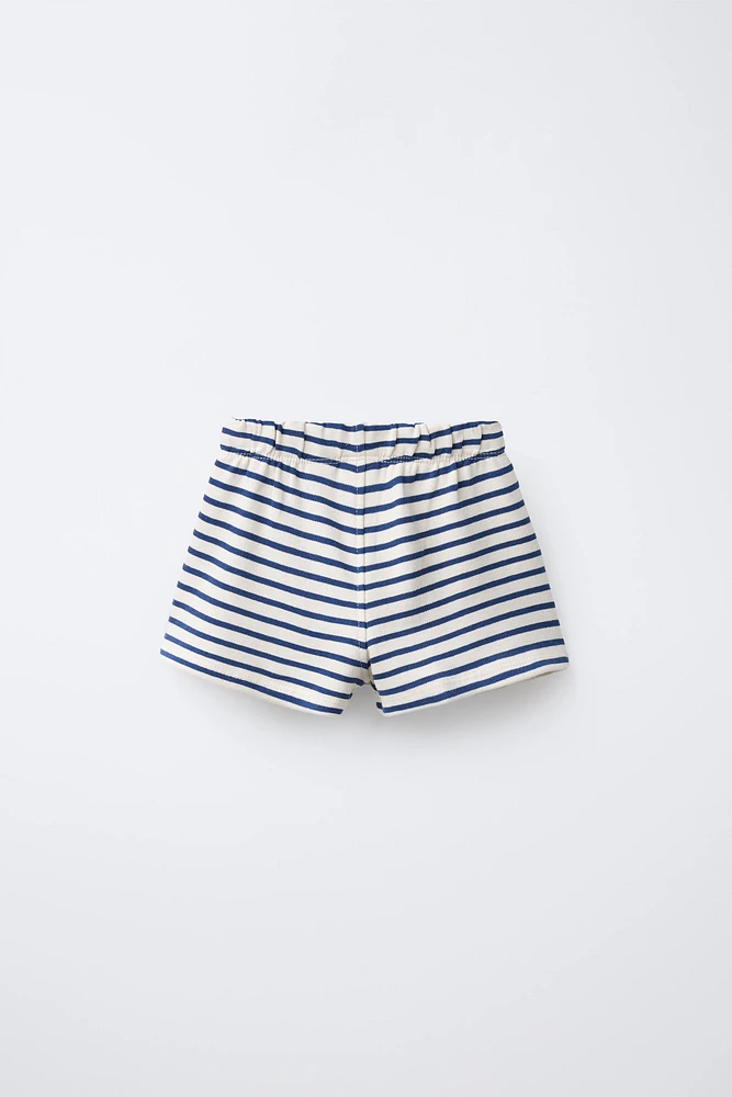 LOT DE DEUX BERMUDAS UNIES ET À RAYURES