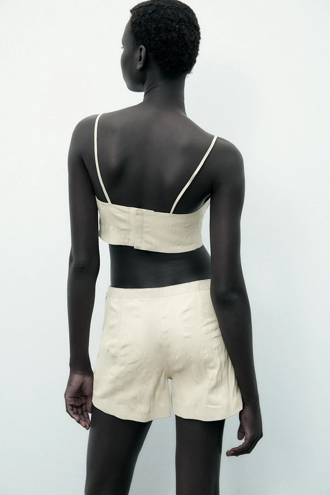 SHORT EN CUIR 100 % À EFFET PLISSÉ