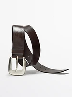 Leather belt with buckle detail